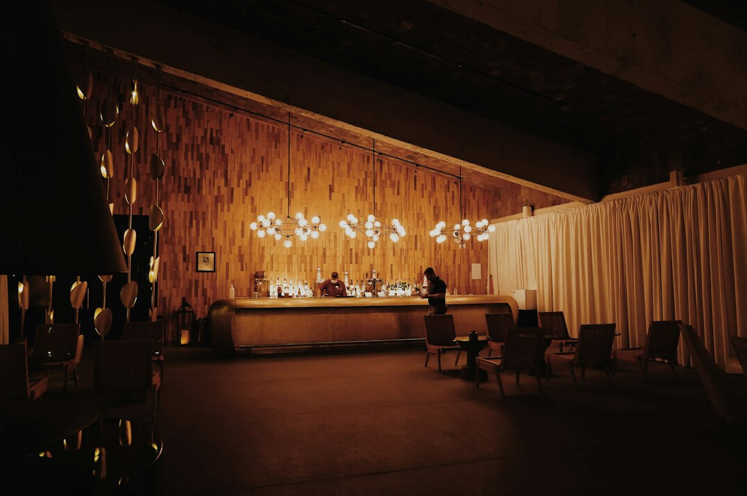 Event stage with lighting before a panel discussion